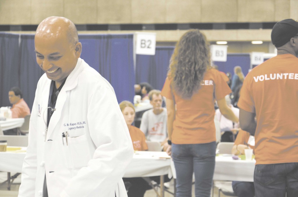 Pictured above is Dr. Kapur, one of the volunteer Emergency Medicine doctors to volunteer at the 2013 National Association of Free Charitable Clinics held in New Orleans | Photo courtesy of NAFC