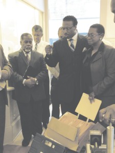 Jeremiah Group members Dr. Rev. Dwight Webster, David Warren, and Jacqueline Jones take a moment for a prayer before bringing close to 10,000 letters to Baton Rouge, urging Gov. Jindal to expand Medicaid.