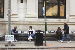 Riders waiting for the bus at Elk Place last Tuesday on chairs from Ride New Orleans.  Photo courtesy of Ride New Orleans