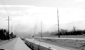 Dust from Kinder Morgan’s coal terminal clouds Highway 23 in Myrtle Grove.  Courtesy of Bryan Ernst