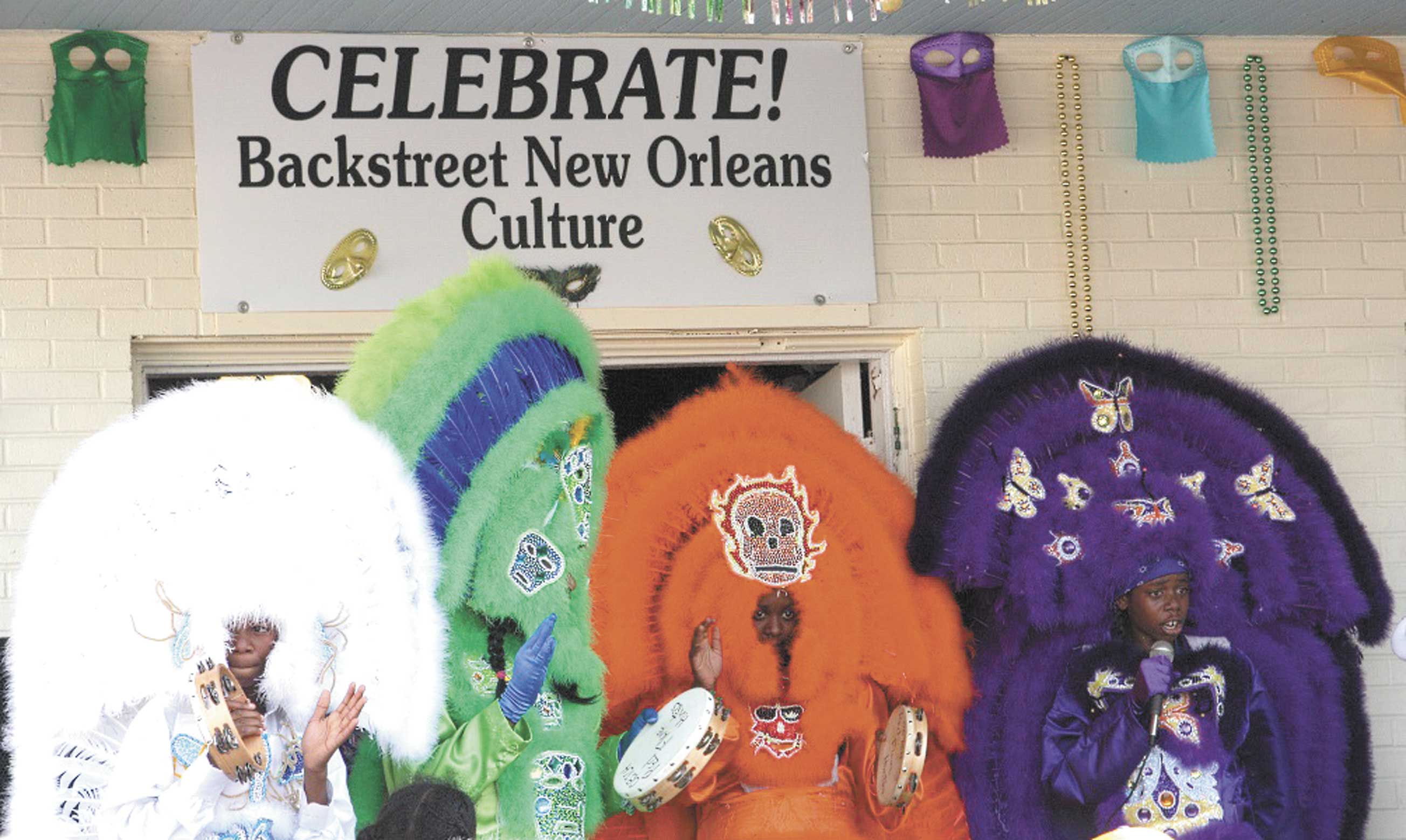 Mardi Gras Indians outside of the Backstreet New Orleans Culture Museum