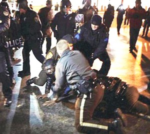 Police arresting protesters in Ferguson, Missouri, Nov. 20, 2014