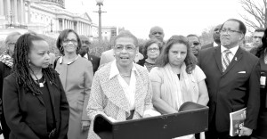 congresswoman Eleanor Holmes Norton (D-DC), extreme right, has requested an investigation into federal government spending with Black and Hispanic-owned newspapers. At her left is Dennis Rolark Barnes, NNPA Chair and publisher of The Washington Informer.