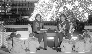 First Lady Michelle and Olympic swimmer Simone Manuel read stories to children after the lighting of the National Christmas Tree.