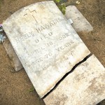 In this June 30, 2016 photo, the gravestone of Cornelius "Neely" Hawkins, one of the slaves in Georgetown University's 1838 slave sale, is seen in Immaculate Heart of Mary Catholic Cemetery in Maringouin, La.