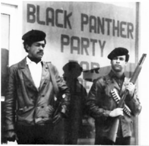 Bobby Seale and Huey Newton, co-founders of the Black Panther Party for Self Defense, with their guns.