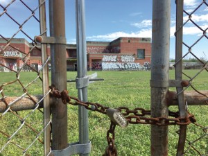 Moton Elementary School on Abundance Street seen through the fence that surrounds its yard. The U.S. Environmental Protection Agency declared the school and area around it a Superfund Site in 1994.