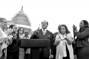 NNPA President and CEO Dr. Benjamin F. Chavis, Jr., speaks outside of the U.S. Capitol during a joint press conference with the NNPA and the National Association HIspanic Publications on Capitol Hill in March 2016. D.C. Congresswoman Eleanor Holmes Norton (far left) joined the press conference to call for the GAO report to examine how much federal agencies spend on advertising with minority-owned firms.