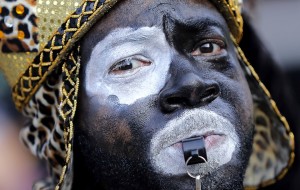 A parading member of the Zulu Social Aid and Pleasure Club on Mardi Gras Day, 2018.