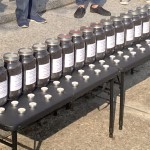 Jars are used to represent some of the residents who have died while living on the Agriculture Landfill on which their homes were built