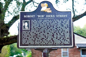 A plaque honoring Robert "Bob" Hicks was place in front of his house when the street name where his home is located was changed to honor him.