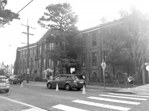 Parents drop off their children at Audubon Charter School housed at McDonogh No. 7 building on Milan Street.