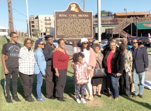 Members of Royal Brooks family gathered on November 9 for the dedication and unveiling of a historical marker in his honor. In February 1948, as Brooks was boarding a bus at the Grenta ferry landing, he offered to swap nickels for a woman ahead of him who had boarded the wrong bus. The bus driver became angered and hailed Grenta police officer Alvin Bladsacker, who walked Brooks about a block from the bus stop and shot him twice in the back.