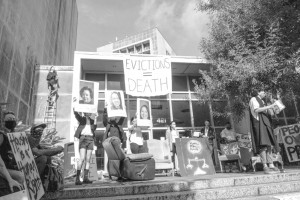 A group of anti-eviction protesters blocks entrances to First City Court and Civil District Court on July 30, 2020.