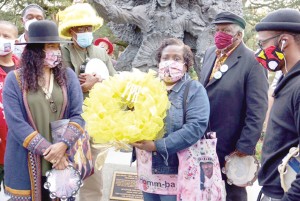 Big Chief Darryl Montana, second from left, with Diana Honore and his sister, Denise Montana Stevenson during the Annual Big Chief Allison "Tootie" Montana Day celebrated each year on King's Day, January 6.

Photo by Keith Hill