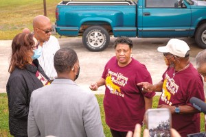 Carolyn Peters, middle, speaks to the Environmental Protection (EPA) administrator Michael S. Regan during his stop in Mossville, while Peggy Anthony and Stafford Frank, left, and McKeever Edwards, right, listen. A ProPublica investigation found more than 1,000 toxic air hot spots across the country, and determined Black residents were disproportionately at risk. As a result, Regan went on a "Journey to Justice" trip that included stops in Mossville, La. and Cancer Alley, a stretch of land in Louisiana along the Mississippi River. Environmental experts called EPA's response to ProPublica's investigation historic and a "radical change in tone." Photo courtesy of the EPA via ProPublica