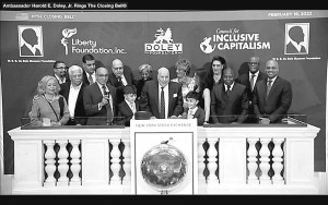 Amb. Harold E. Doley Jr., center, is surrounded by family members and friends as he rings The Closing Bell at the New York Stock Exchange on Friday, February 18 in celebration of his 50th Anniversary of membership on the NYSE. Doley, a New Orleans native, was the first Black to buy a seat on the New York Stock Exchange. He founded Doley Securities LLC in 1975.